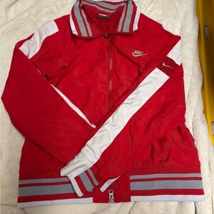 vintage Nike red and white reversible nylon track jacket.